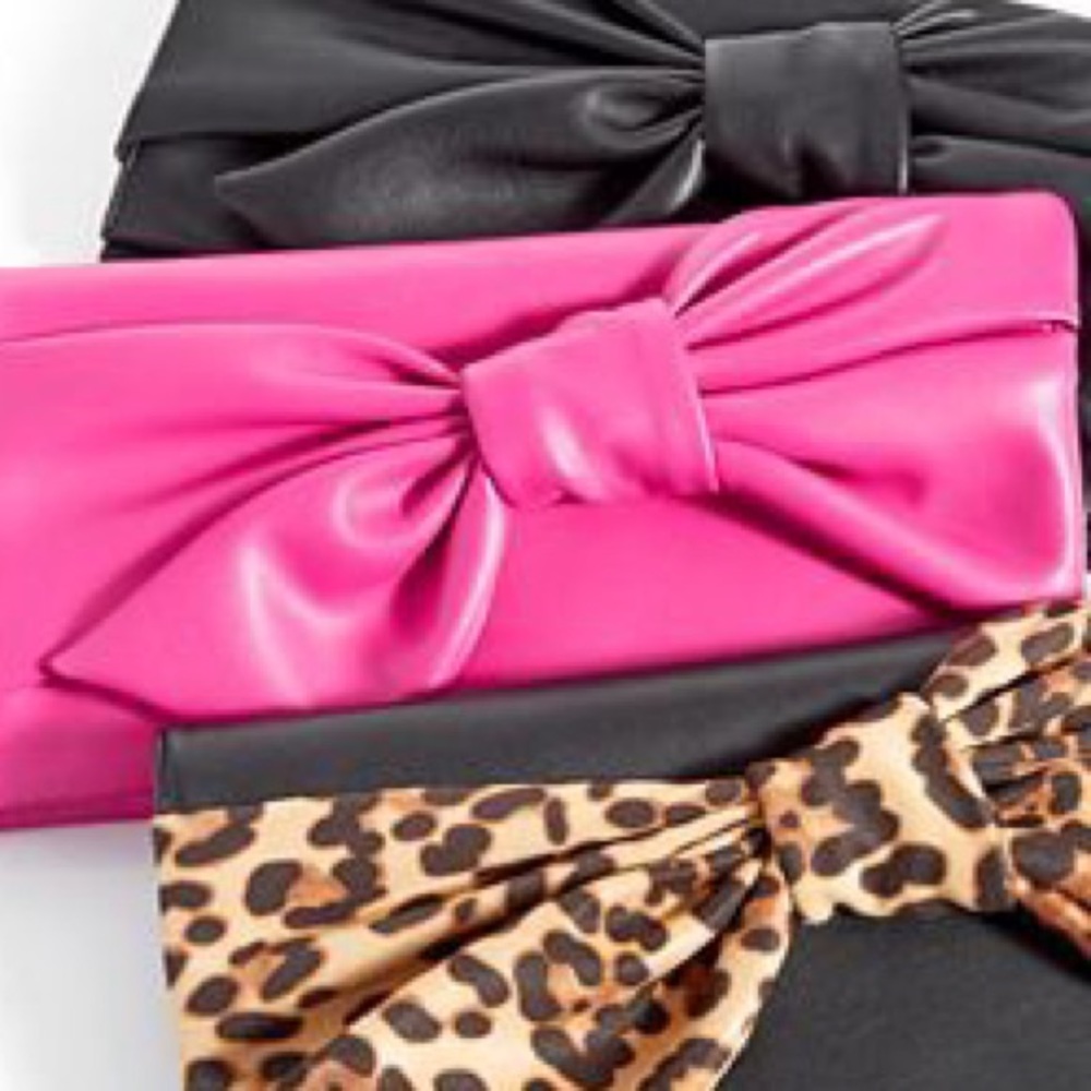 INC Bowah Hands Through Clutch